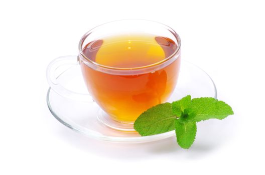 tea in cup with leaf mint and lemon isolated on white 