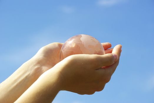 globe on the human hand