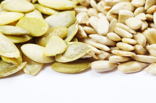 Close up image of sunflower and pumpkin seeds