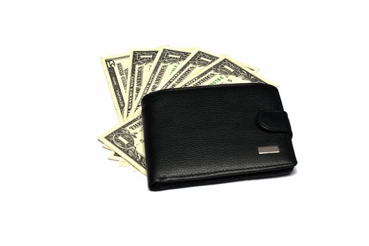 Purse with money in the background
