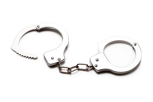 Crime law arrest police steel handcuffs isolated