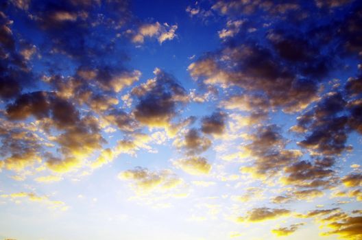 blue sky background with tiny clouds