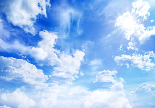 blue sky background with tiny clouds