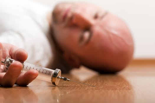 Narcotic drugs addict injecting medicine syringe