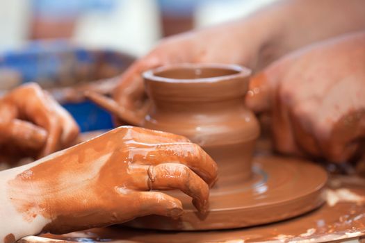 Pottery craft wheel ceramic clay potter human hand