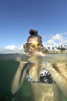 Scuba diving with underwater view.