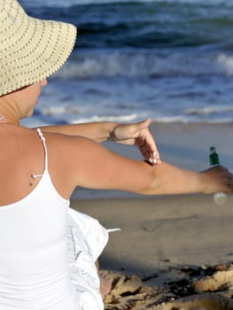 Woman relaxing on the beach