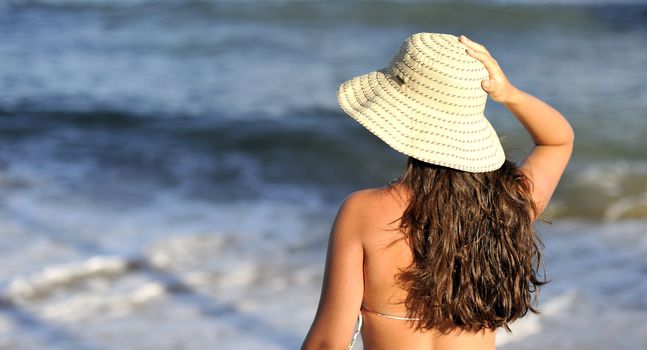 Woman relaxing on the beach