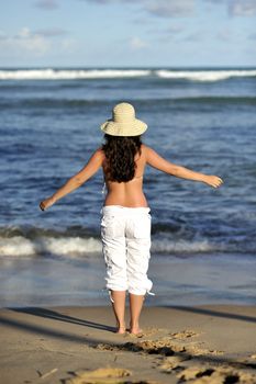 Woman relaxing on the beach