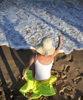 Woman relaxing on the beach