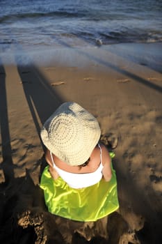 Woman relaxing on the beach