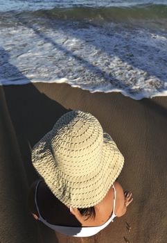 Woman relaxing on the beach