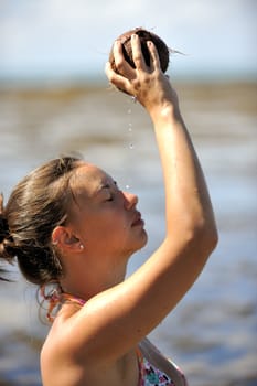 Woman refreshing on the beach