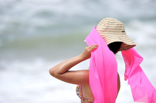 Woman enjoying on the beach, Brazil