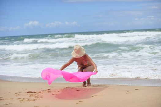 Woman enjoying on the beach, Brazil