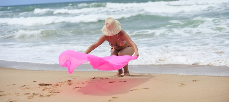 Woman enjoying on the beach, Brazil