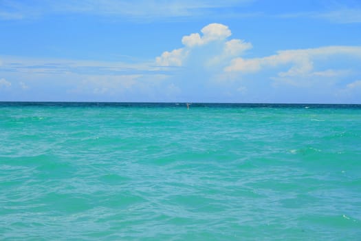 A seascape with beautiful and clear water.
