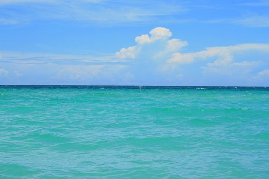 A seascape with beautiful and clear water.
