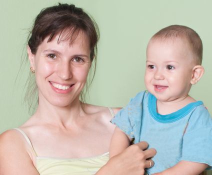 Smiling mother and little child in family hapiness