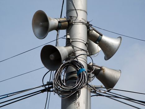 Sound speaker on pole and blue sky