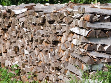 Stack of wood log or heap of lumber firewood