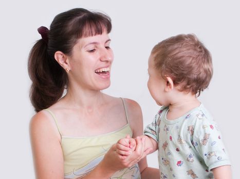 Smiling mother and little child in family hapiness