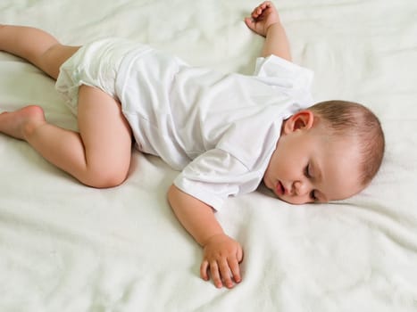 Little child sleeping in happiness and family love