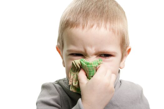 Human child cold flu illness tissue blowing nose