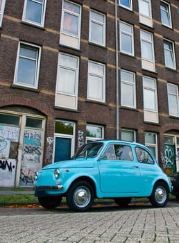 Classic Vintage City Car in Blue on Street