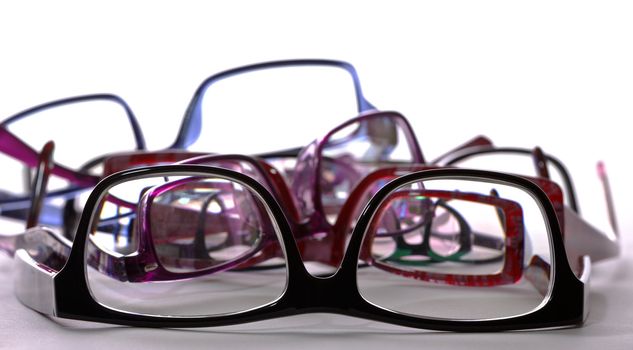 photo of a lot of eyeglasses
