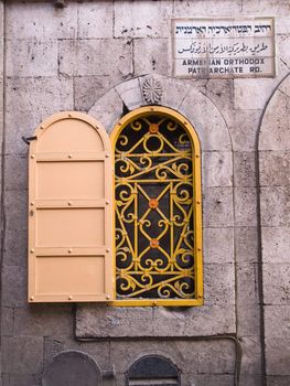 Armenian orthodox patriarchate Street sign and a window Jerusalem Israel