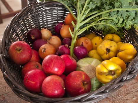 Selection organic healthy vegetables and fruits in a country style basket