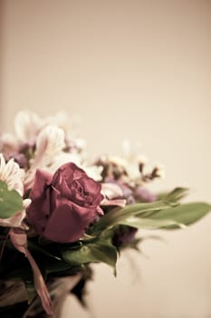 Bouquet with red rose toned photo