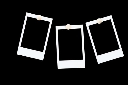 isolated blank polaroids frames on black background
