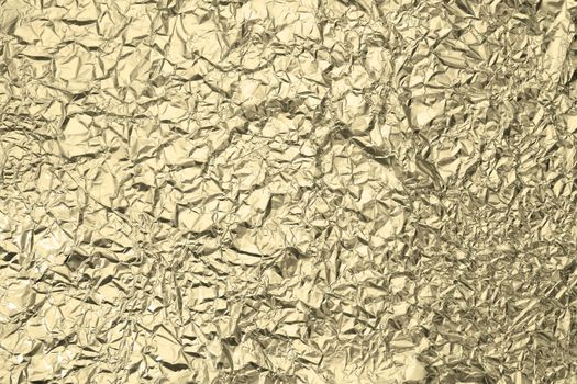 Pattern of Wrinkled Gold Aluminium Foil Paper using as background