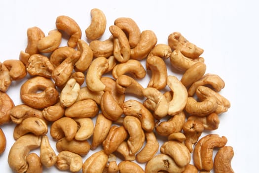 Roasted Cashew with salt isolated on white
