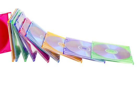 colorful CDs in boxes piled in a heap isolated on a white background
