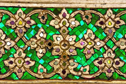 Pattern of green Thai Traditional Ornament on Temple door