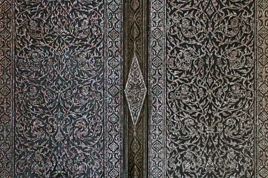 Beautiful Decorate luxury door at Wat Phra Keao, Grand Palace Bangkok Thailand