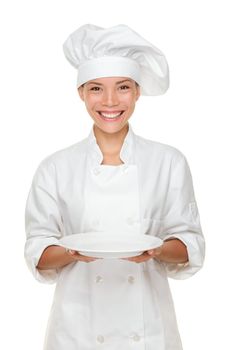 Chef showing empty plate. Woman cook or chef serving empty plate smiling happy isolated on white background. Young multiracial female chef.