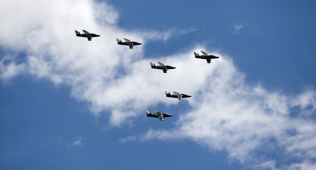 Formation of Military Airplanes on blue sky