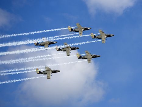 Formation of Military Airplanes on blue sky