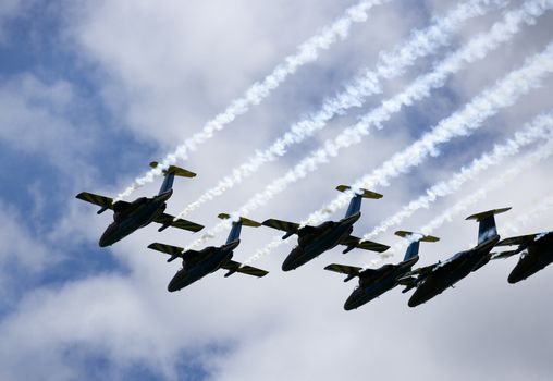 Formation of Military Airplanes on blue sky