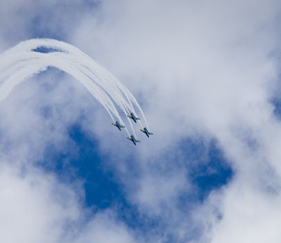 Formation of Military Airplanes on blue sky