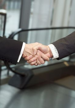 Close-up of a handshake with selective focus