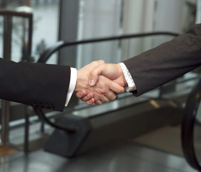 Close-up of a handshake with selective focus