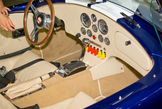 beige leather interior of retro sports car