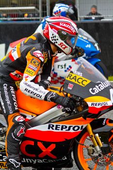 JEREZ DE LA FRONTERA, SPAIN - NOV 20: 125cc motorcyclist Alex Rins waiting on the starting gates in the CEV Championship race on November 20, 2011 in Jerez de la Frontera, Spain.