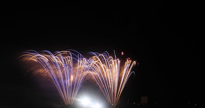 Japanese traditional fireworks in the night sky 