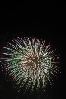 Japanese traditional fireworks in the night sky 